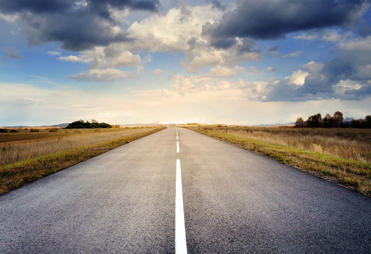 empty asphalt road heading off to the horizon